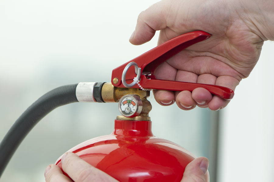 How many fire extinguishers should a business have?